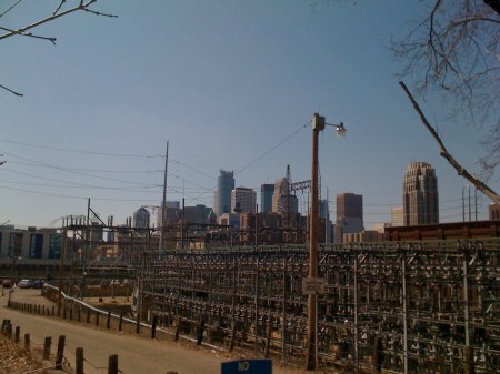 view of downtown minneapolis from the east bank of the mississippi (with hydroplant)