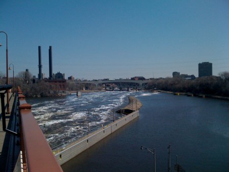 east view of mississippi (including a view of the new 35w bridge) from the stone arch bridge